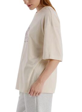 Camiseta New Balance beige flores para mujer