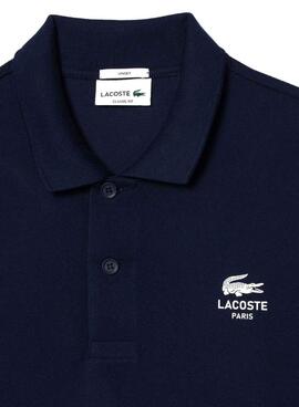 Polo Lacoste L.12.12 logo estampado marino para hombre y mujer