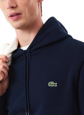 Sudadera Lacoste con capucha de felpa marino para hombre