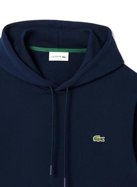 Sudadera Lacoste con capucha de felpa marino para hombre