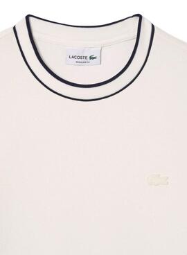 Camiseta Lacoste beige con cuello de rayas para hombre